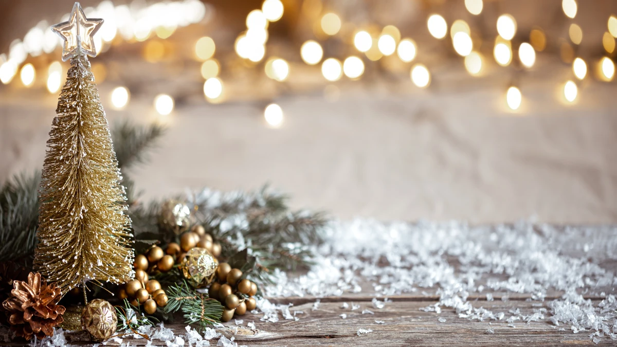 winter-cozy-background-with-festive-decor-details-snow-wooden-table-bokeh-concept-festive-atmosphere-home