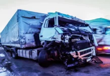 damaged-truck-road-against-sky